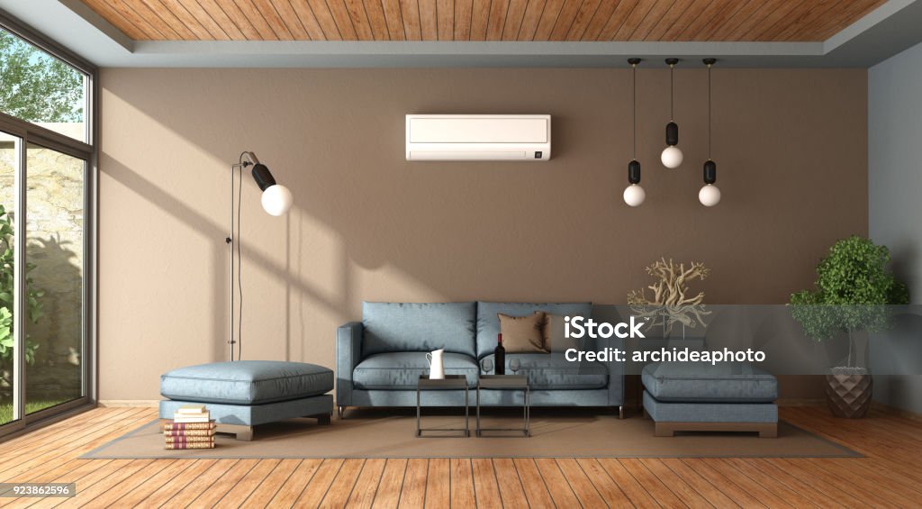 Blue and brown living room with air conditioner Blue and brown living room with air conditioner , sofa and footstool - 3d rendering
 Air Conditioner Stock Photo