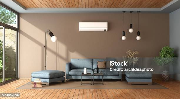Blue And Brown Living Room With Air Conditioner Stock Photo - Download Image Now - Air Conditioner, Domestic Life, Living Room