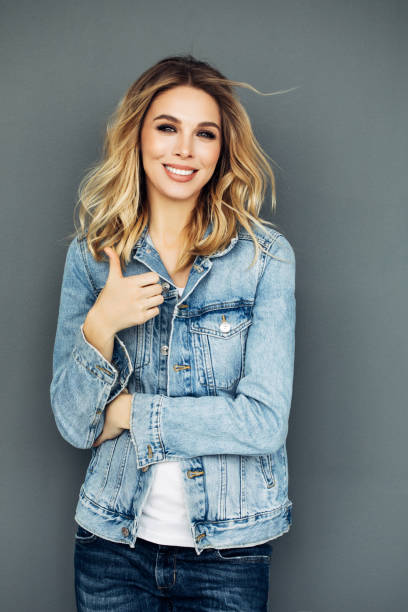 istock Beautiful woman wearing jeans jacket 923865470