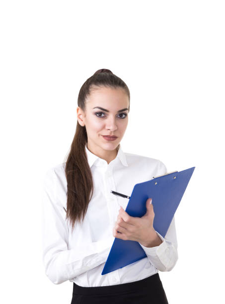 istock Beautiful young businesswoman writing 923865758
