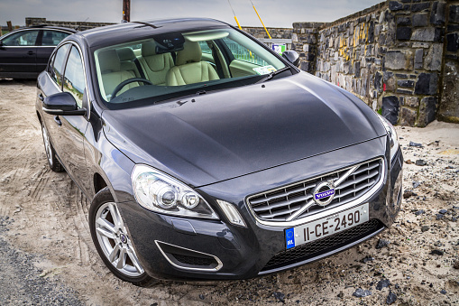 Lahinch, Ireland - March 13, 2012:  Motor car Volvo V60 parked at the beach in Lahinch, Ireland