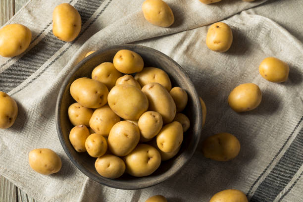 istock Raw Organic Yellow Baby Potatoes 923873284