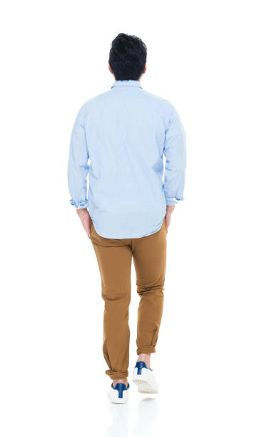istock Handsome Korean Male walking with hands in pocket 923879302