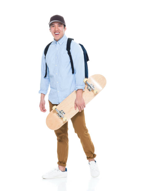 istock Handsome Korean Male Student With Skateboard 923880306