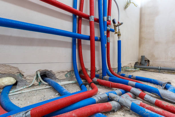 istock Water pipes of central heating system in boiler room 923881100