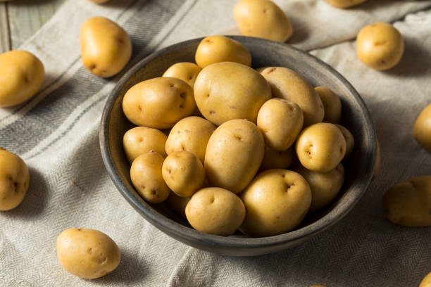 istock Raw Organic Yellow Baby Potatoes 923883658