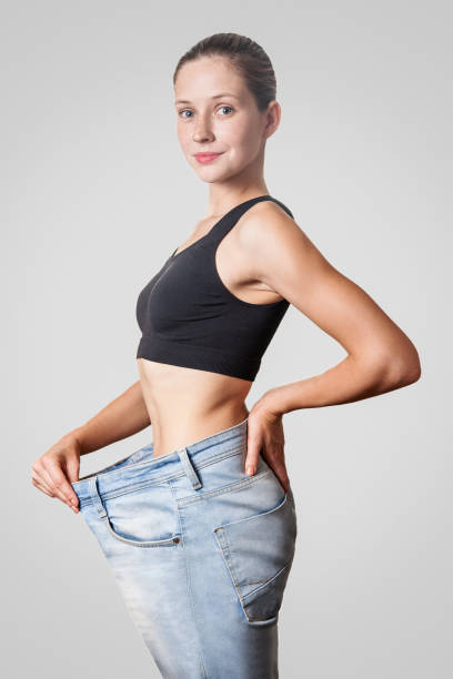 istock diet concept and hanppy woman 923890954