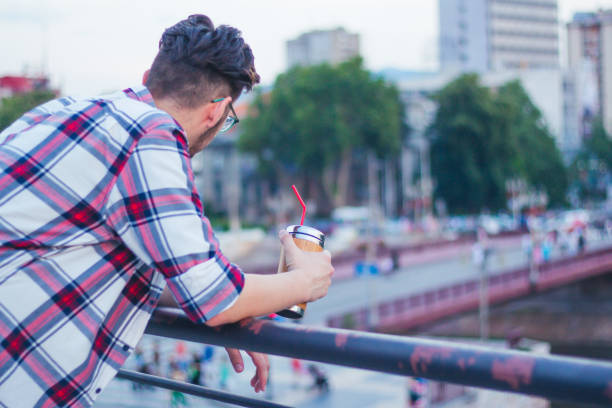 istock Young man relaxing outdoor. 923891196