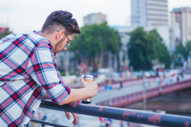 istock Young man relaxing outdoor. 923891322