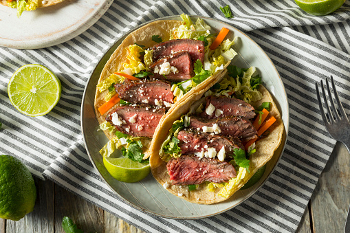 Homemade Korean Steak Tacos with Cabbage Cilantro and Cheese