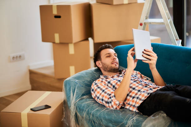 istock Man in new apartment 923907700