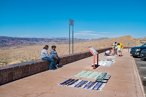 Native women sell jewelry at a highway stop on Highway 93 in Arizona