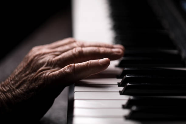 istock Senior playing the piano 923921034