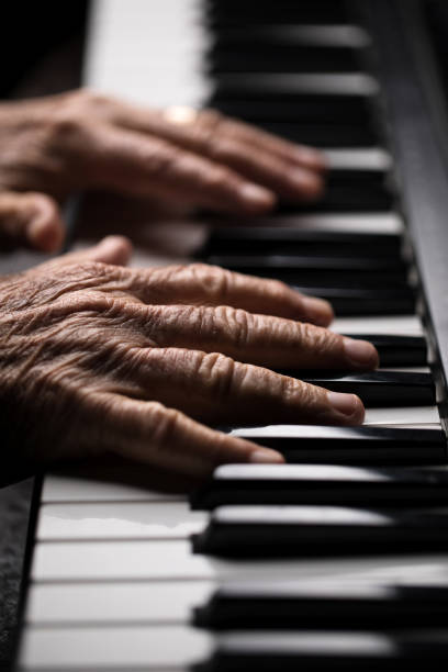 istock Senior playing the piano 923921066