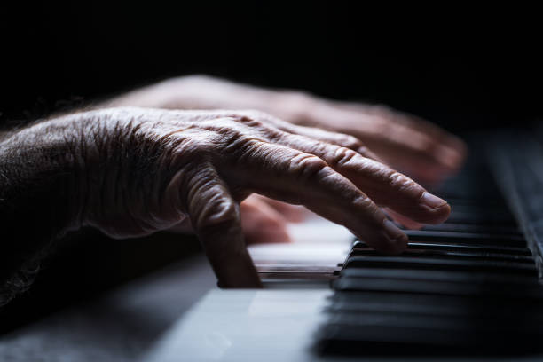 istock Senior playing the piano 923921074