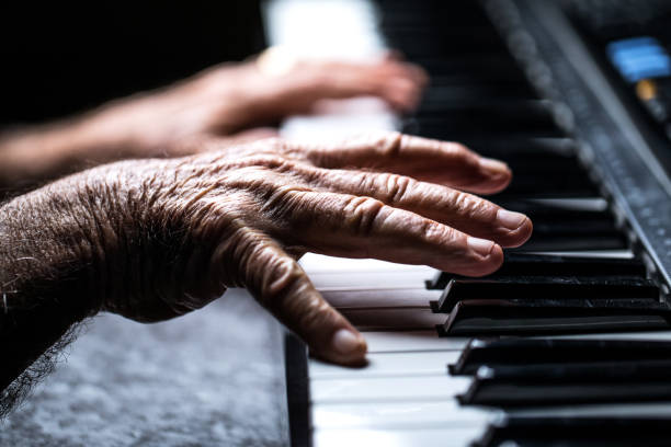 istock Senior playing the piano 923921174