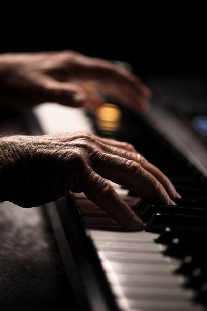 istock Senior playing the piano 923921722