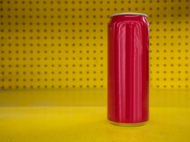 istock Red aluminum can on yellow and polka dot background. Mockup Template Ready For Your Design 923923310