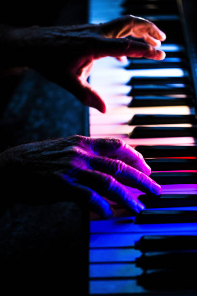 istock Senior playing the piano 923923336