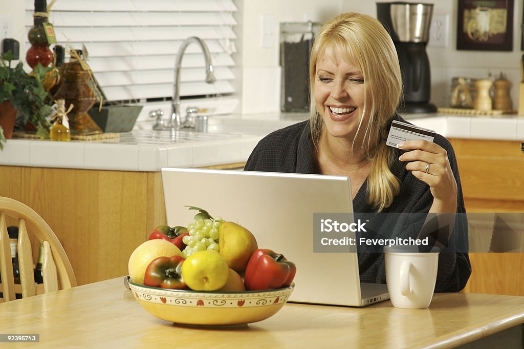 Woman using laptop for Ecommerce  Adult Stock Photo