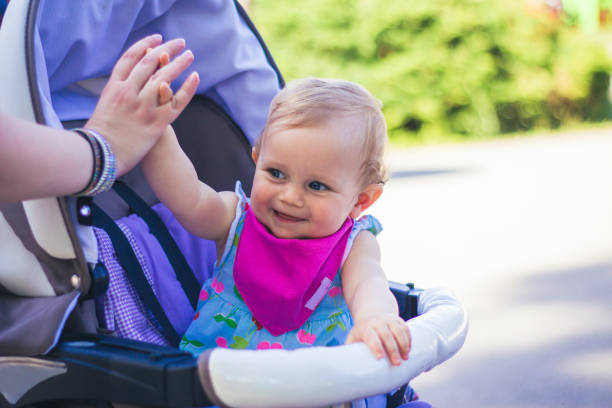 istock Little baby girl give me five. 923959012