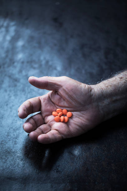 istock Senior man with medicine pills 923965210