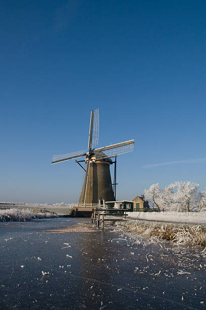 istock Windmill near frozen lake 92396622