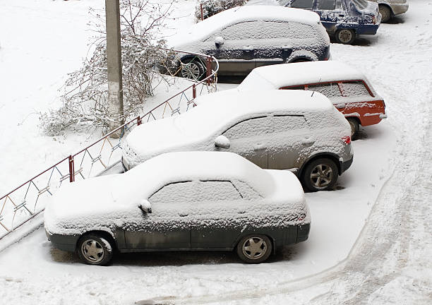 istock Cars covered in snow after snowstorm 92396758