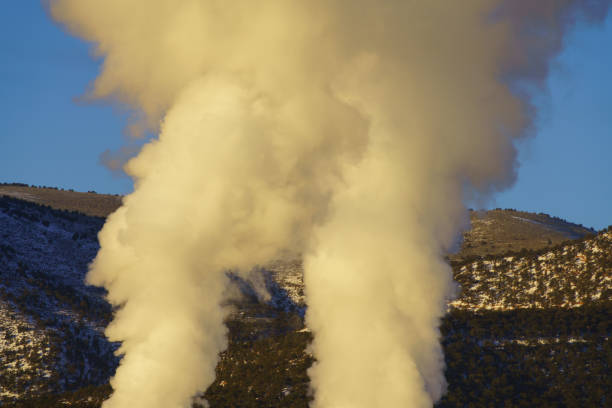 Smoky Looking Steam Plumes Rising - Clouds of water vapor gases being released into the atmosphere.