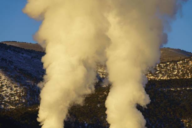 Smoky Looking Steam Plumes Rising - Clouds of water vapor gases being released into the atmosphere.