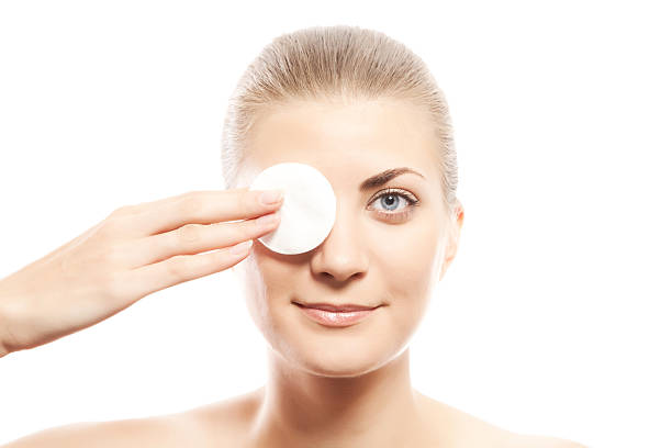 istock Woman Removing Make Up and smiling 92396943
