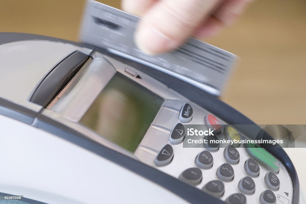 Swiping Credit Card  Blurred Motion Stock Photo