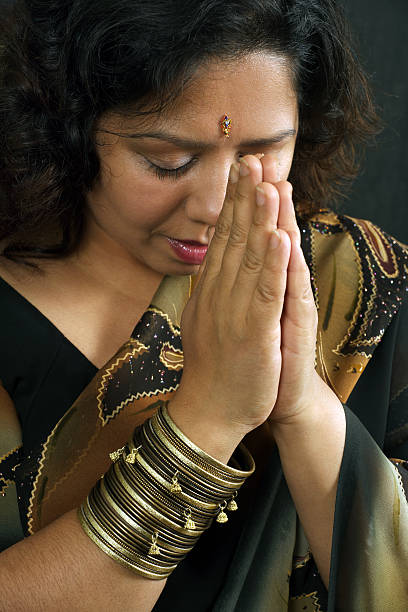 istock Indian woman praying 92397203