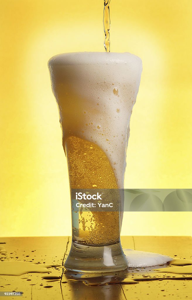 Pouring a beer  Alcohol - Drink Stock Photo