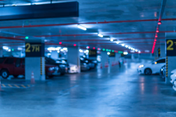 istock Blurred image Parking garage In the mall for background. 923975082