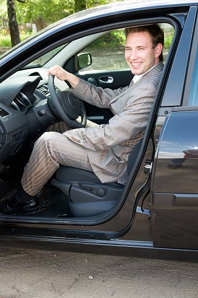 istock businessman at the wheel 92398482