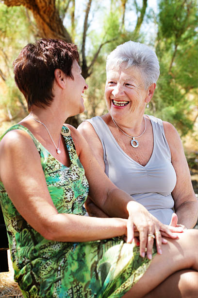istock beautiful senior mother and daughter chatting 92399145