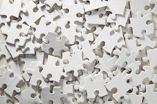 Jigsaw Puzzle unassembled in white