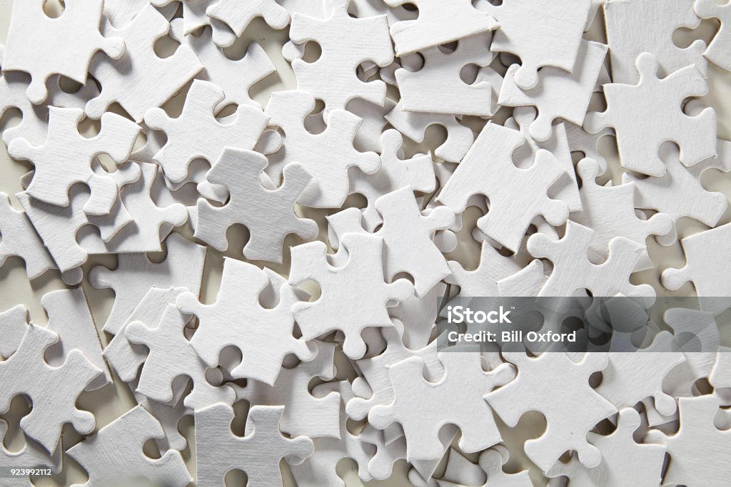 Blank Jigsaw Puzzle random Jigsaw Puzzle unassembled in white Jigsaw Piece Stock Photo