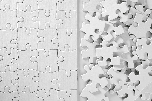 Jigsaw Puzzle unassembled in white and together