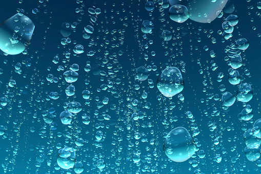 Close-up of water drops on silver surface, wet background