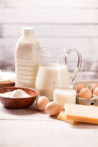 istock Dairy products on wooden table 923997468