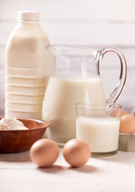 istock Dairy products on wooden table 923997568