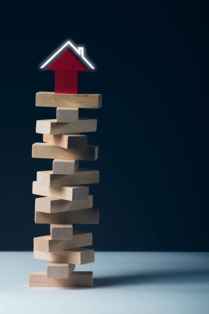istock Mortgage concept wooden puzzle 923997850