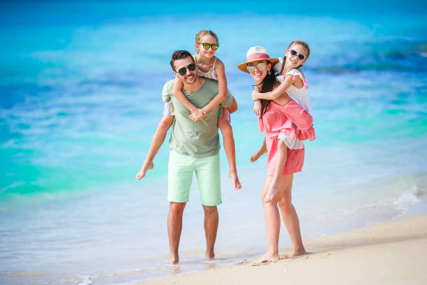 istock Happy family on beach vacation 923999062