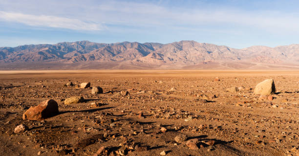 Panamint Range Mountains Death Valley National Park California Lunar looking dry arid landscape in the basin at Death Valley North America lakebed stock pictures, royalty-free photos & images