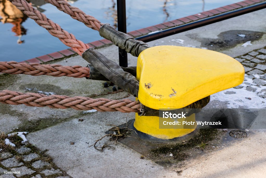 Mooring Rope Of A Large Ship Standing In The Port Harbor Cape Wrapped With  A Mooring Rope Season Of The Early Spring Stock Photo - Download Image Now  - iStock