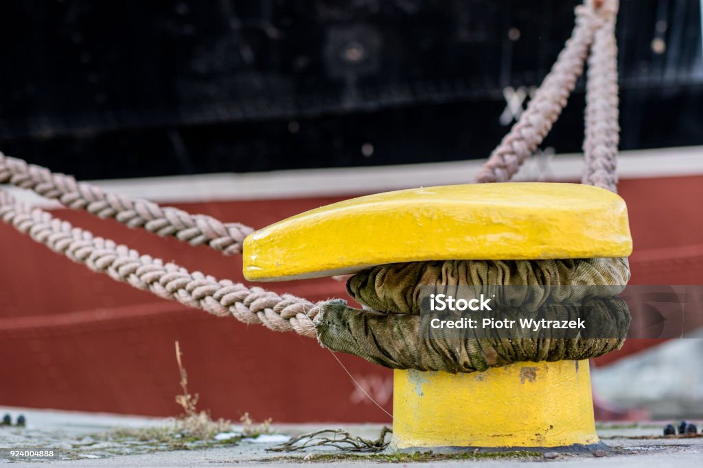 Mooring Rope Of A Large Ship Standing In The Port Harbor Cape