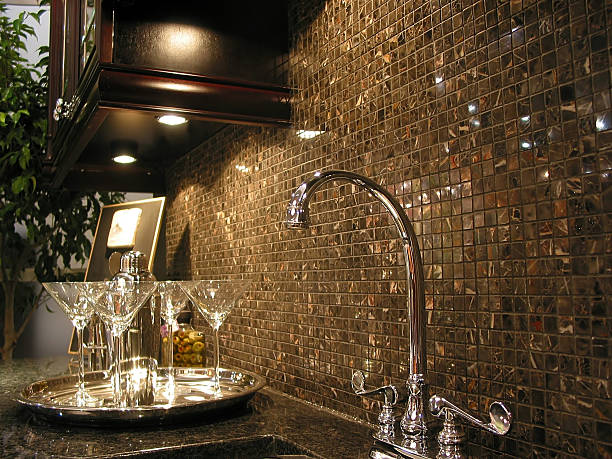 istock Modern kitchen with a steel sink tile backsplash and glasses 92400510