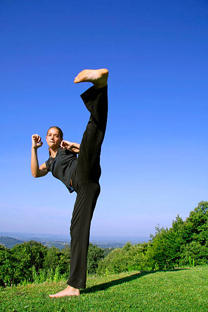 kick - sole of foot martial arts karate female fotografías e imágenes de stock